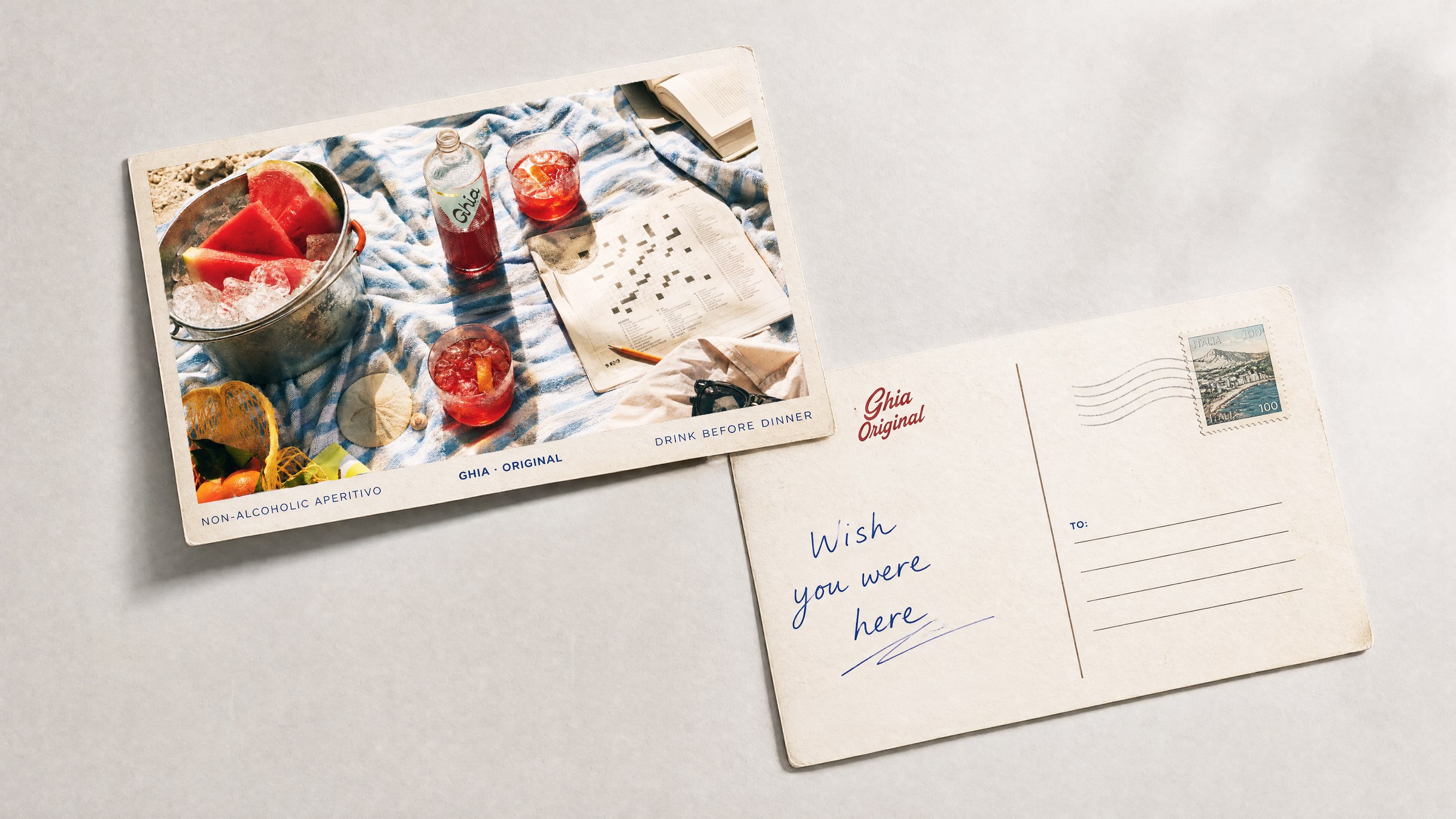 Ghia postcard campaign mockup with beach aperitif imagery