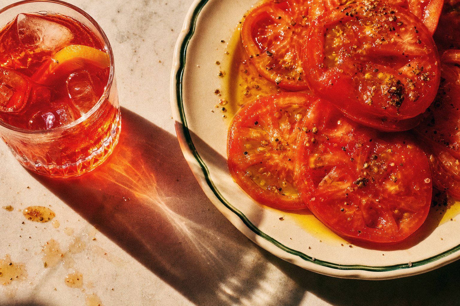 Graphic tomato plate with Ghia aperitif glass